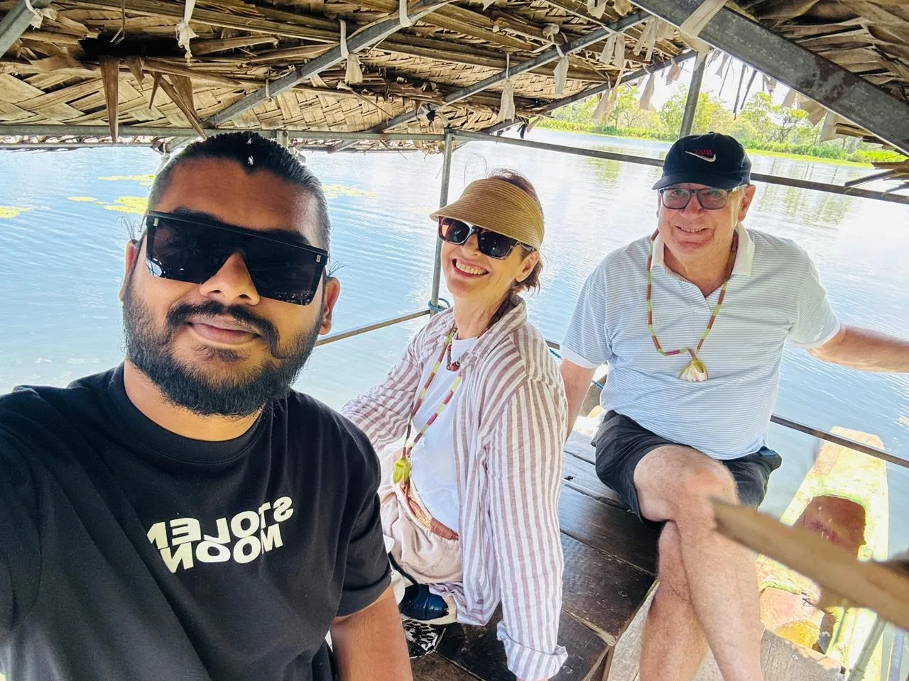 Traditional thatched boat ride with Adhi